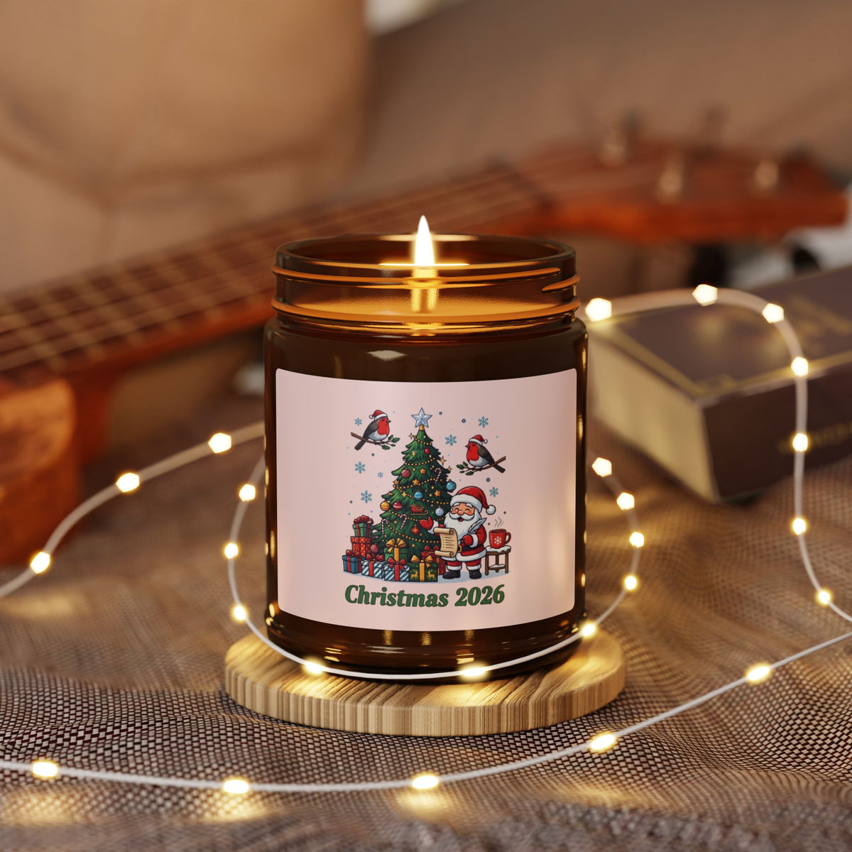 Candela di Natale 2026 in vaso ambrato